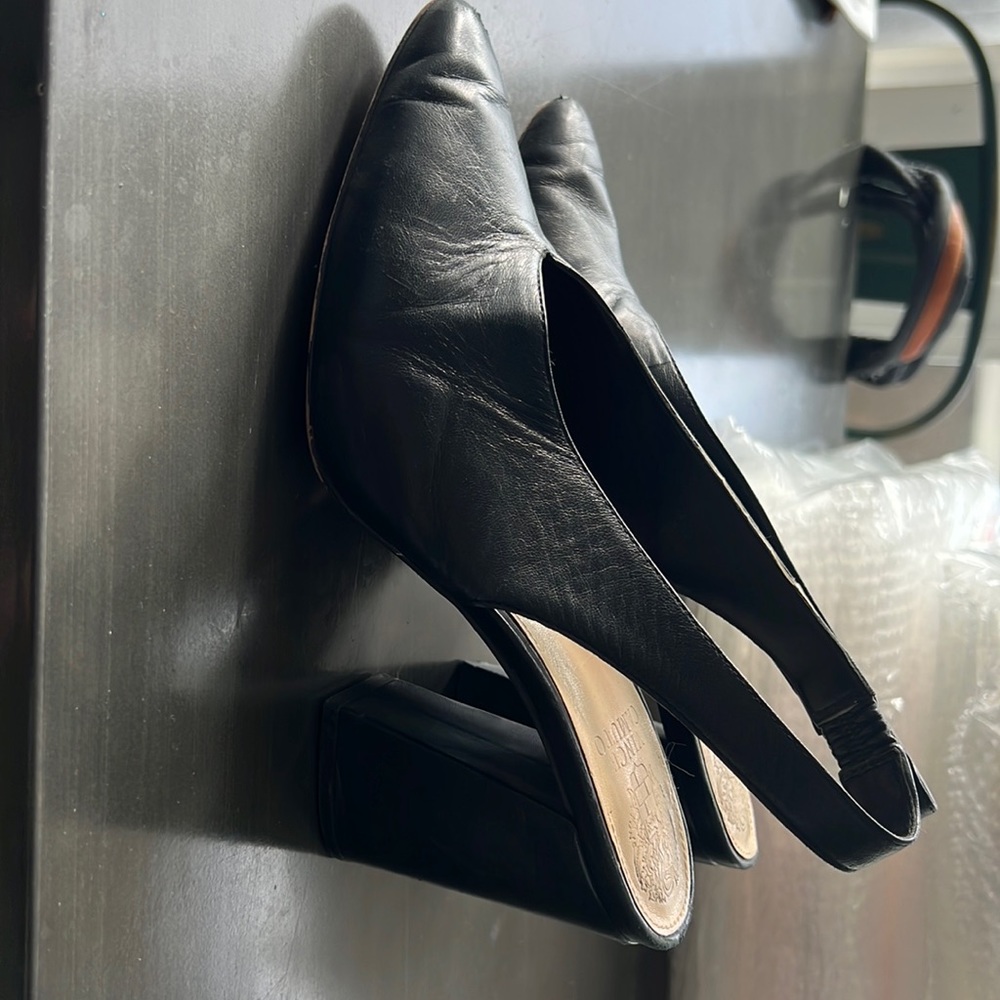 Vince Canute. Size 8.5. Black leather Mule heels with back strap.
